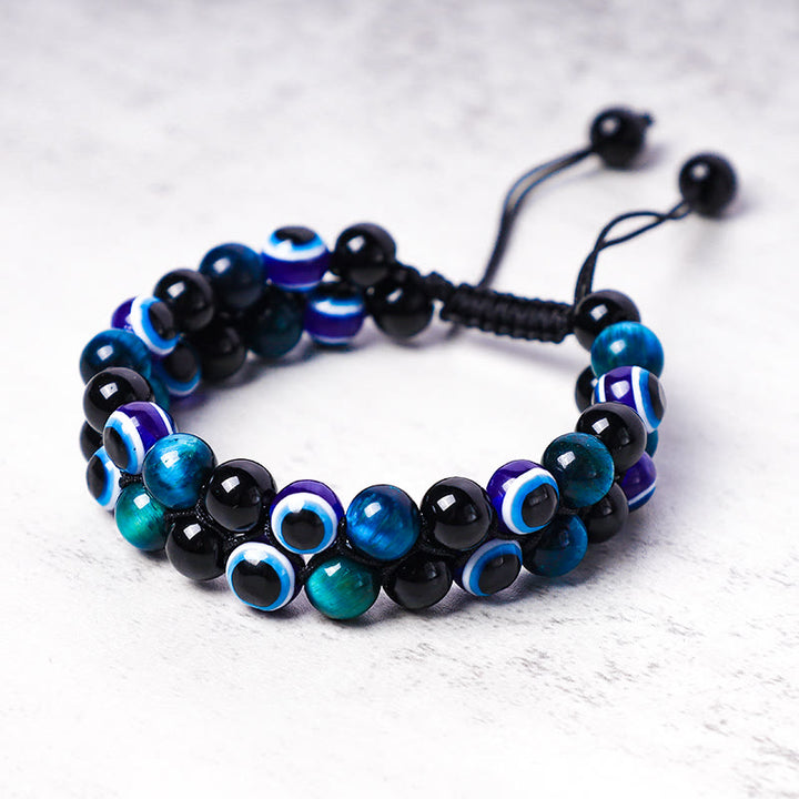 Bracelet de perles de protection contre le mauvais œil en hématite et œil de tigre Buddha Stones