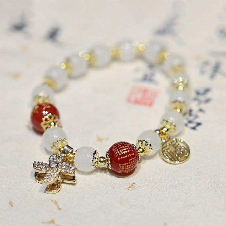 Bracelet de bénédiction avec breloque en forme de moulin à vent en Buddha Stones et caractère Fu