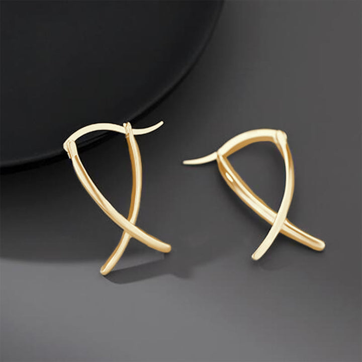 Boucles d'oreilles créoles porte-bonheur à motif géométrique croisé