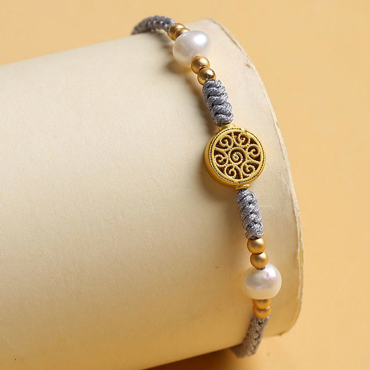 Bracelet tressé en corde bleue avec perles et arbre de fortune en cuivre et Buddha Stones