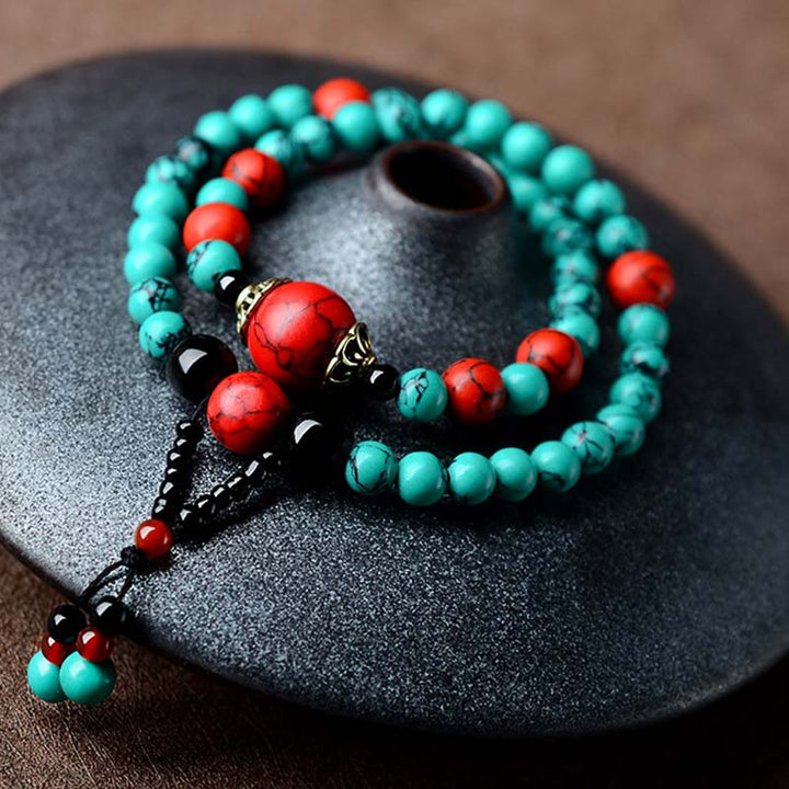 Bracelet de protection en perles de turquoise rouge et onyx noir Buddha Stones