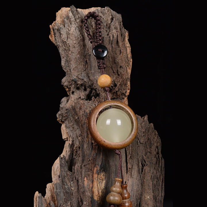Porte-clés porte-bonheur lumineux en Buddha Stones en bois de santal rouge et bois d'ébène en bois de santal vert