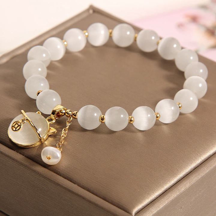 Bracelet à breloques en perles avec motif de chat et œil de chat en Buddha Stones - image 4