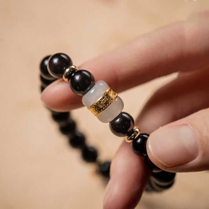 Bracelet magnétique pour couple en obsidienne Buddha Stones et jade Om Mani Padme Hum