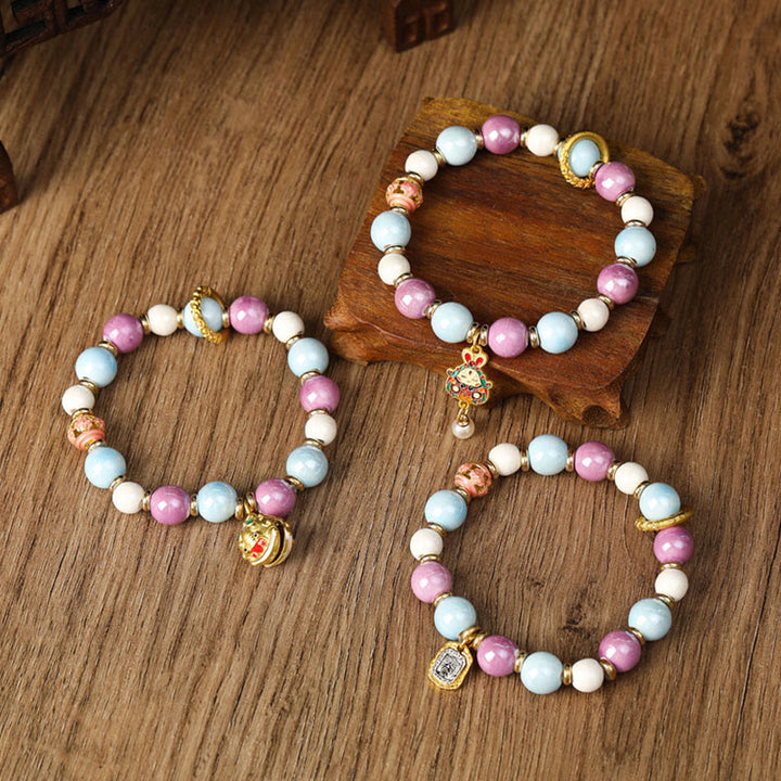 Buddha Stones Tibétain Zakiram Déesse de la Richesse Lapin Tête de Lion Charme Liuli Verre Encens Cendres Perle de Porcelaine Bracelet de Protection