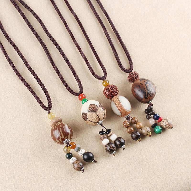 Collier pendentif Buddha Stones Bodhi Seed Lotus Sagesse Harmonie - image 1