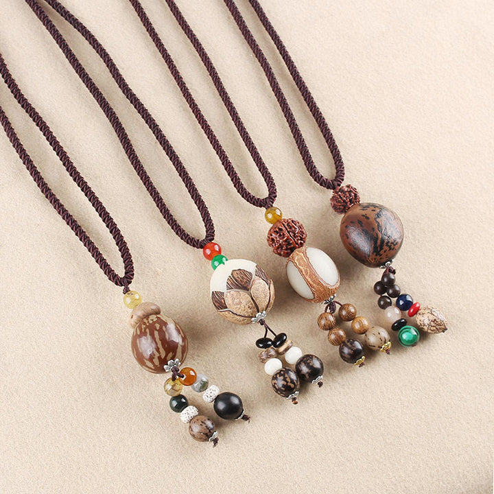 Collier pendentif Buddha Stones Bodhi Seed Lotus Sagesse Harmonie - image 1