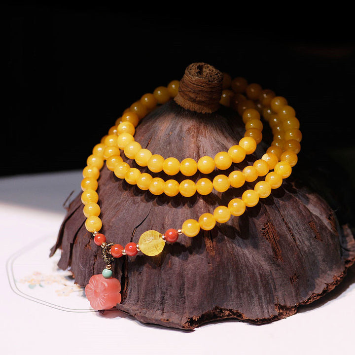 Collier d'équilibre et de guérison en ambre, bracelet à breloques en forme de fleur