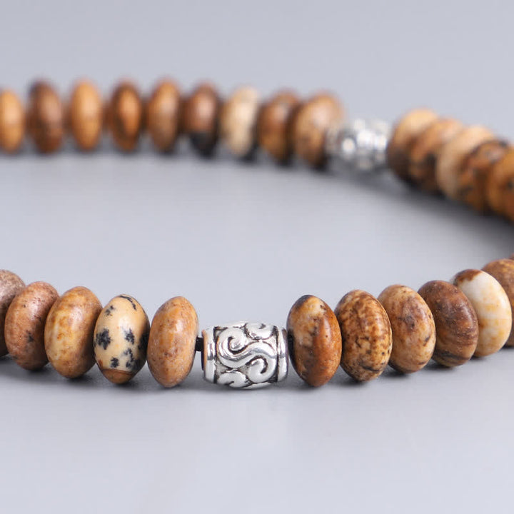 Bracelet en fil de perles positives en jaspe photo