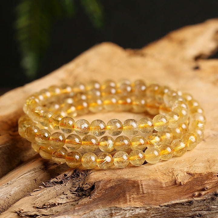 Bracelet de protection et de prospérité en Buddha Stones en citrine naturelle