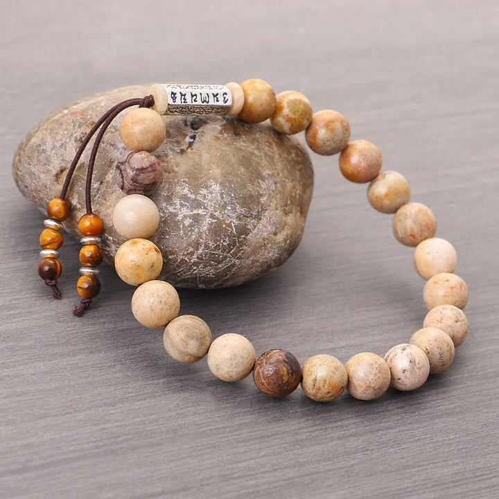 Bracelet de renforcement en pierre vieillie Buddha Stones Om Mani Padme Hum