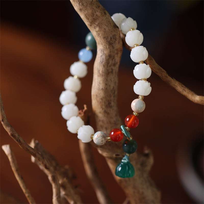 Bracelet de paix et d'harmonie sculpté en perles de lotus et graines de Bodhi en Buddha Stones