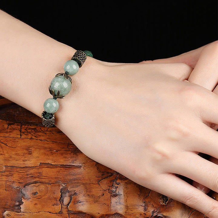 Bracelet de prospérité en perles de jade et corde verte fait main avec Buddha Stones