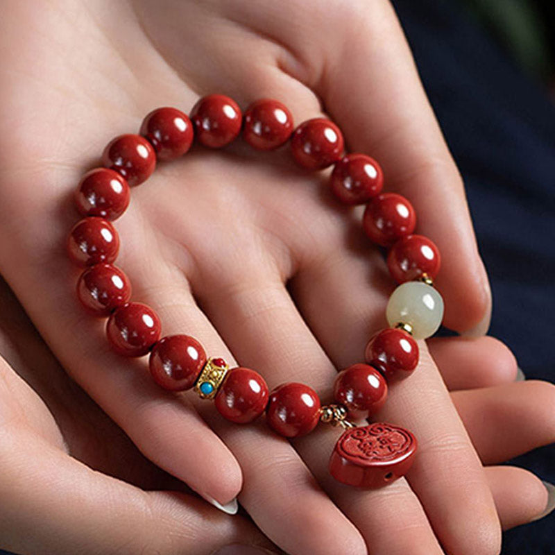 Bracelet de protection et de guérison en jade cinabre et Buddha Stones
