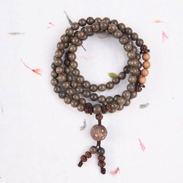 Bracelet Mala avec breloque de protection en bois de santal tibétain et Buddha Stones