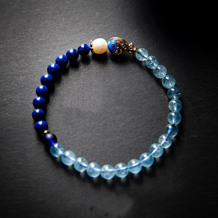 Bracelet de guérison en Buddha Stones, aigue-marine naturelle, lapis-lazuli et poisson - image 2