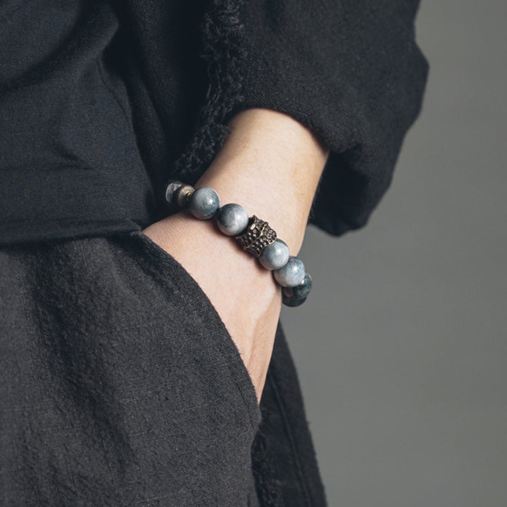 Bracelet de couple en cuivre et bois d'ébène avec pierre œil d'aigle et Buddha Stones