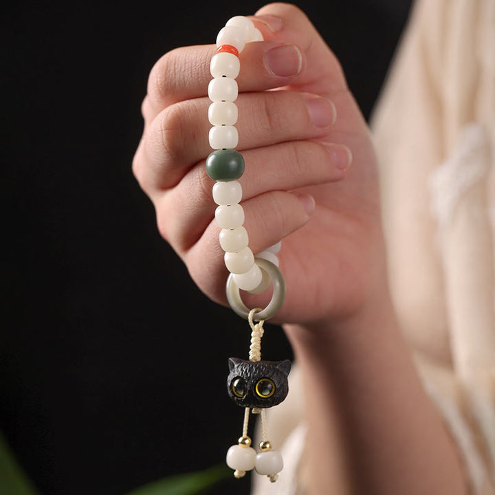 Bracelet en Buddha Stones en graines de Bodhi naturelles en bois noir africain avec joli chat et breloque pour la paix et l'harmonie - image 3