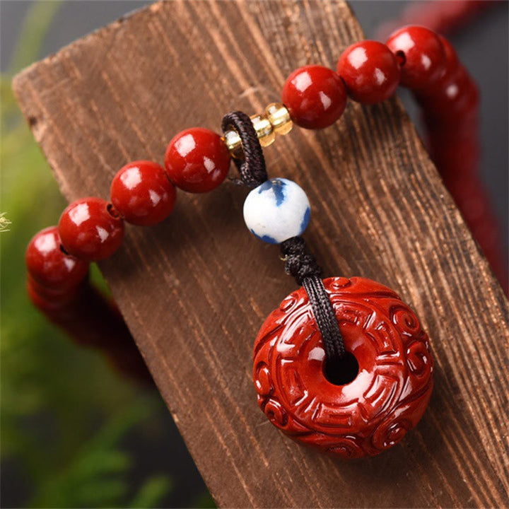 Bracelet Mala tibétain à triple tour avec boucle de paix et Buddha Stones