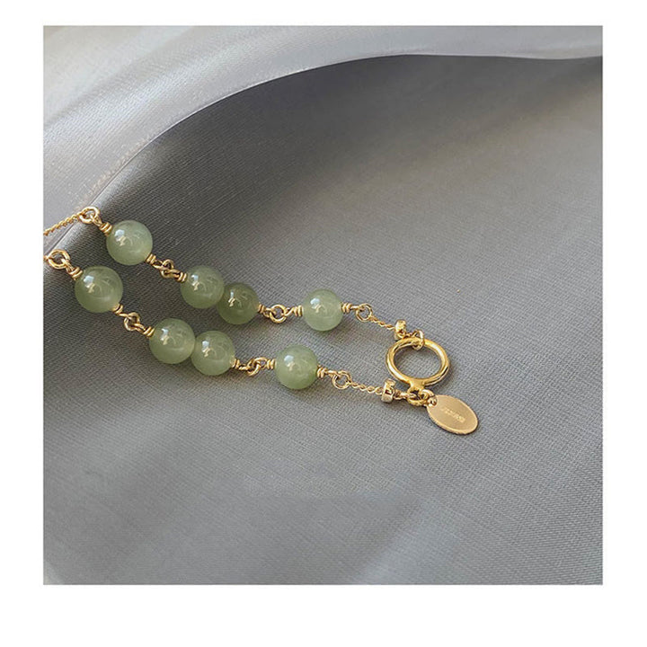 Bracelet chaîne de prospérité en perles de jade Hetian plaqué or 14 carats