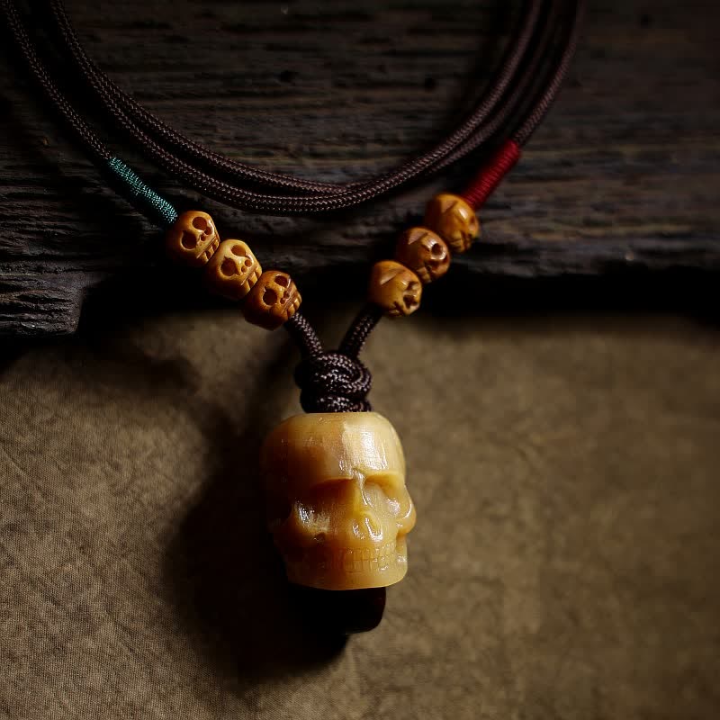 Collier pendentif en os de chameau tibétain Buddha Stones et crâne du Seigneur des cadavres