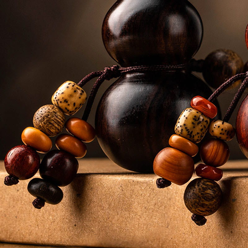 Porte-clés porte-bonheur en ébène tibétain à petites feuilles de gourde en bois de santal rouge