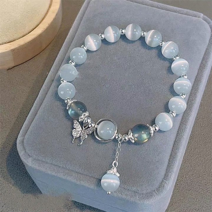 Bracelet de soutien à breloques en forme d'étoile, de papillon et de pierre de lune avec œil de chat et Buddha Stones
