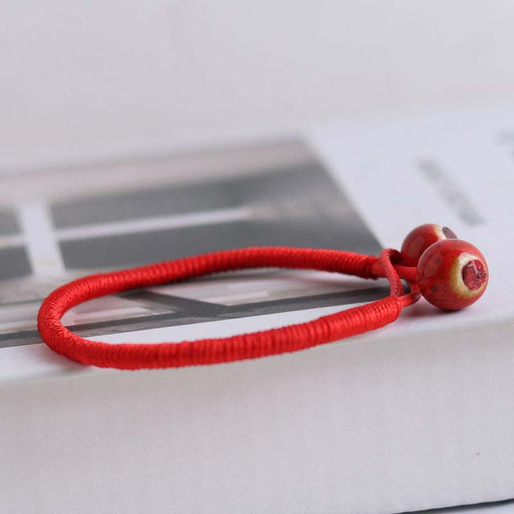 Bracelet en céramique rouge porte-bonheur Feng Shui Buddha Stones et fil rouge - image 6