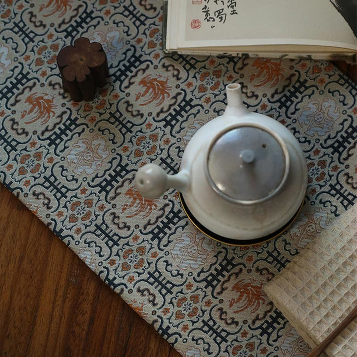 Dessous de verre élégant à motif de brocart floral pour tasse à thé