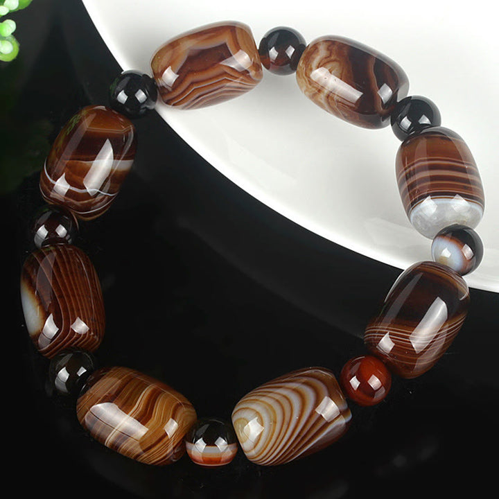 Bracelet de courage et de bonheur en sardonyx naturel Buddha Stones