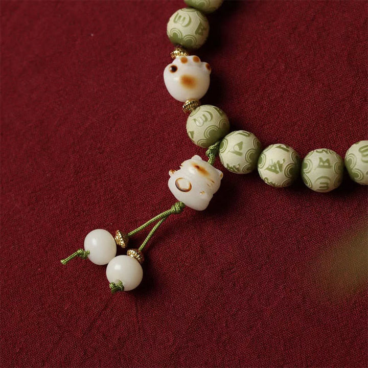 Bracelet de sagesse gravé en forme de patte de chat avec graines de Bodhi vertes et pierres de Buddha Stones Om Mani Padme Hum - image 5