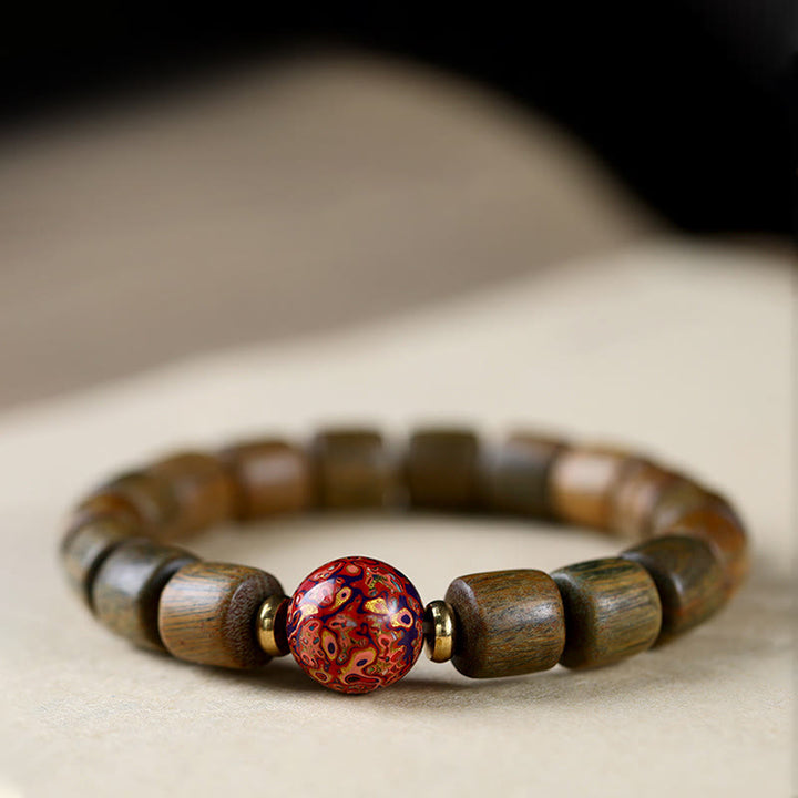 Bracelet de paix en Buddha Stones de bois de santal vert naturel et petites feuilles de bois de santal rouge laqué