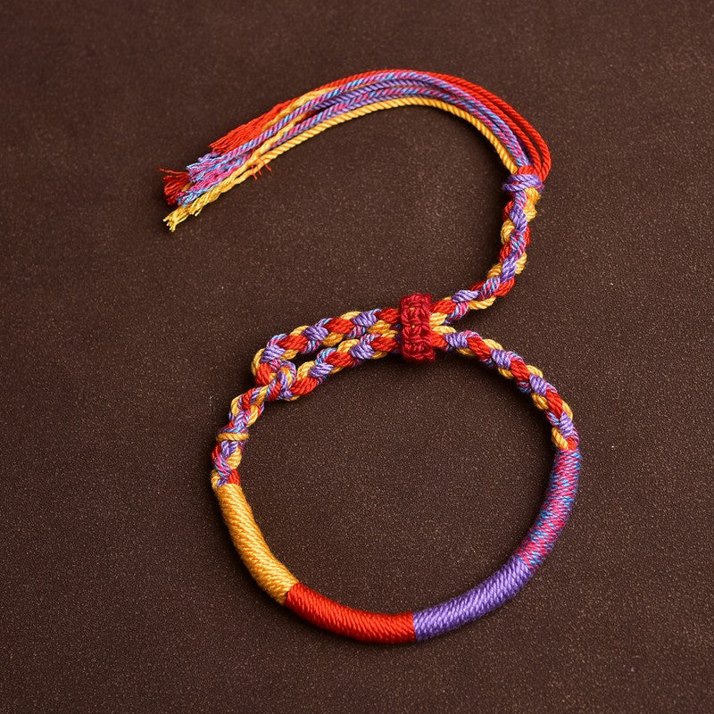 Buddha Stones Bracelet tibétain multicolore en corde d'inspiration folklorique, inspiré du folklore. - Bracelet multicolore (Tour de poignet : 16–20 cm) - image 1