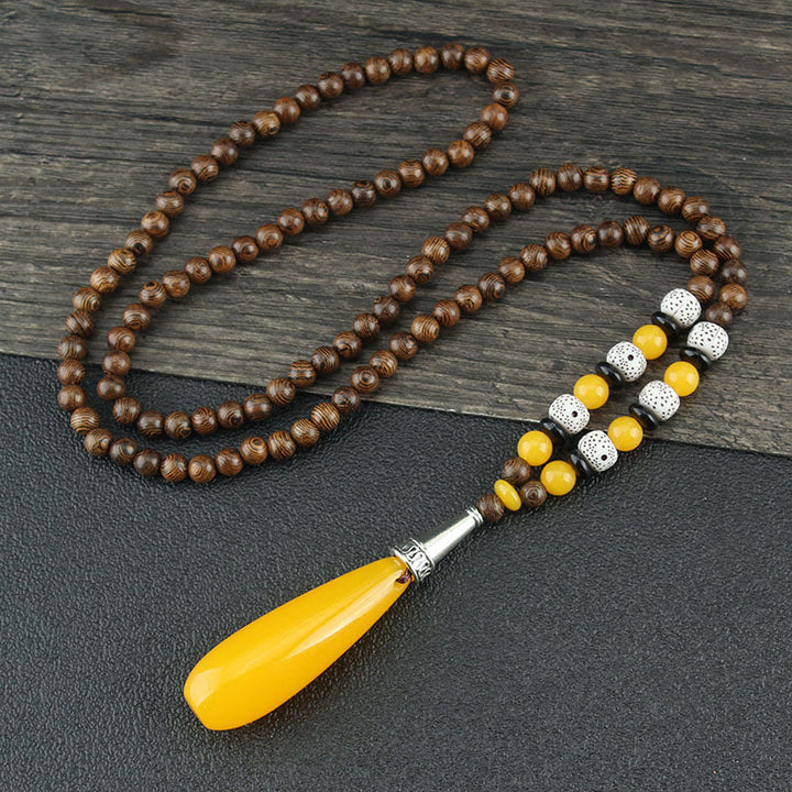 Collier pendentif en Buddha Stones tibétain en bois de wengé Bodhi Seed Agate Balance Peace