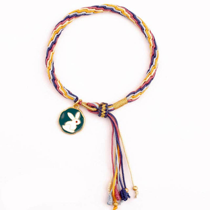 Bracelet tressé de protection avec cordon porte-bonheur et nœud de réincarnation