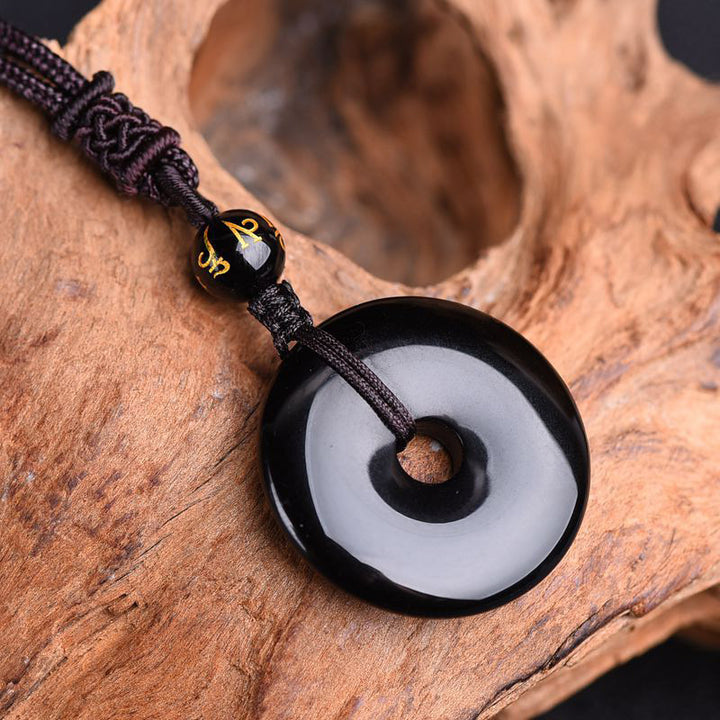 Collier de protection en obsidienne tibétaine Buddha Stones