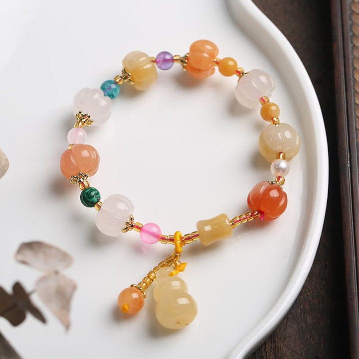 Bracelet à breloques en perles de citrouille Pixiu en soie dorée naturelle et cristaux de jade