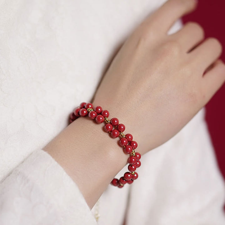 Bracelet de bénédiction en perles de cinabre naturelles de Buddha Stones
