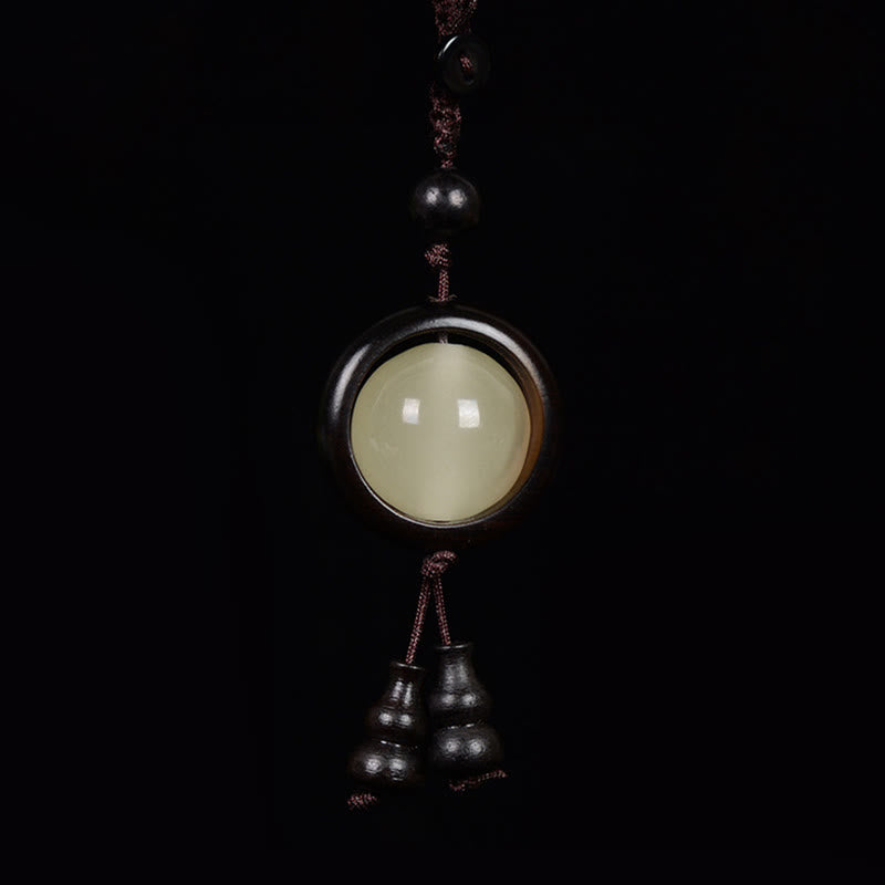 Porte-clés porte-bonheur lumineux en Buddha Stones en bois de santal rouge et bois d'ébène en bois de santal vert