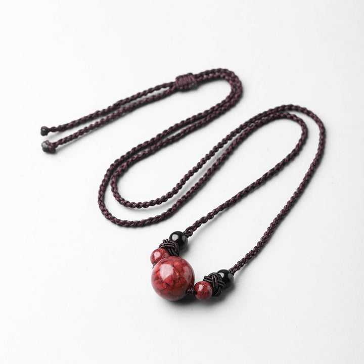 Collier pendentif de bénédiction en perles de pierres de cinabre naturelles de Buddha Stones