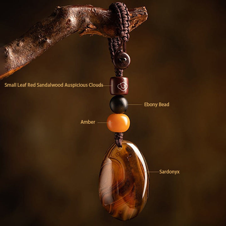 Porte-clés positif en pierre de sardonyx aléatoire Buddha Stones