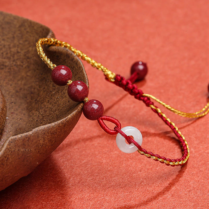 Bracelet de bénédiction avec boucle de paix en jade cinabre naturel de Buddha Stones