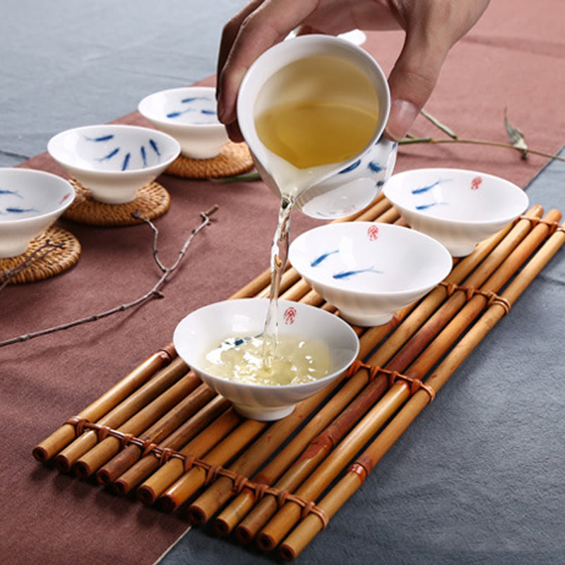 Tasse à thé en céramique de poisson koï en porcelaine bleue et blanche de Jingdezhen Buddha Stones