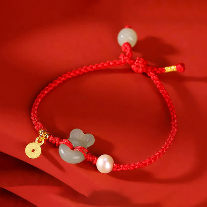 Bracelet en argent sterling 925 avec cordon rouge et pièce de cuivre en jade Hetian Année du lapin
