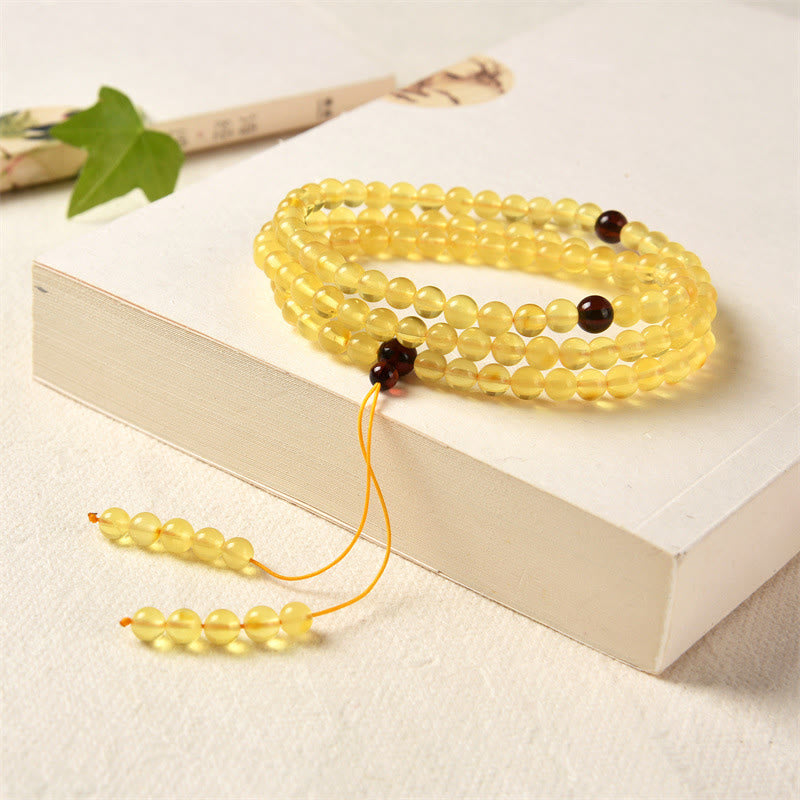 Bracelet Mala Buddha Stones 108 perles en ambre naturel transparent pour l'anxiété