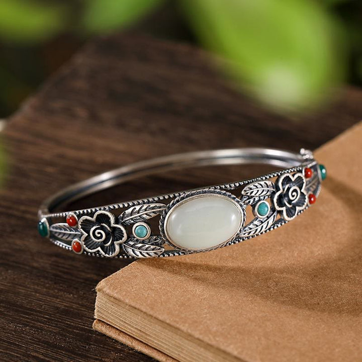 Bracelet jonc porte-bonheur en Buddha Stones, jade cyan, jade blanc, fleur, feuille