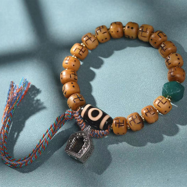 Buddha Stones en os de chameau tibétain naturel, croix gammée Dzi, perle Shankha, breloque de bouddha Kirtimukha, Bracelet à pompon de Protection porte-bonheur