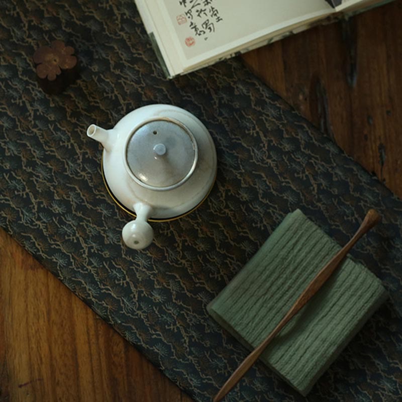 Dessous de verre élégant à motif de brocart floral pour tasse à thé