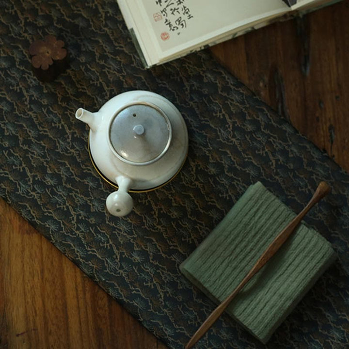 Dessous de verre élégant à motif de brocart floral pour tasse à thé