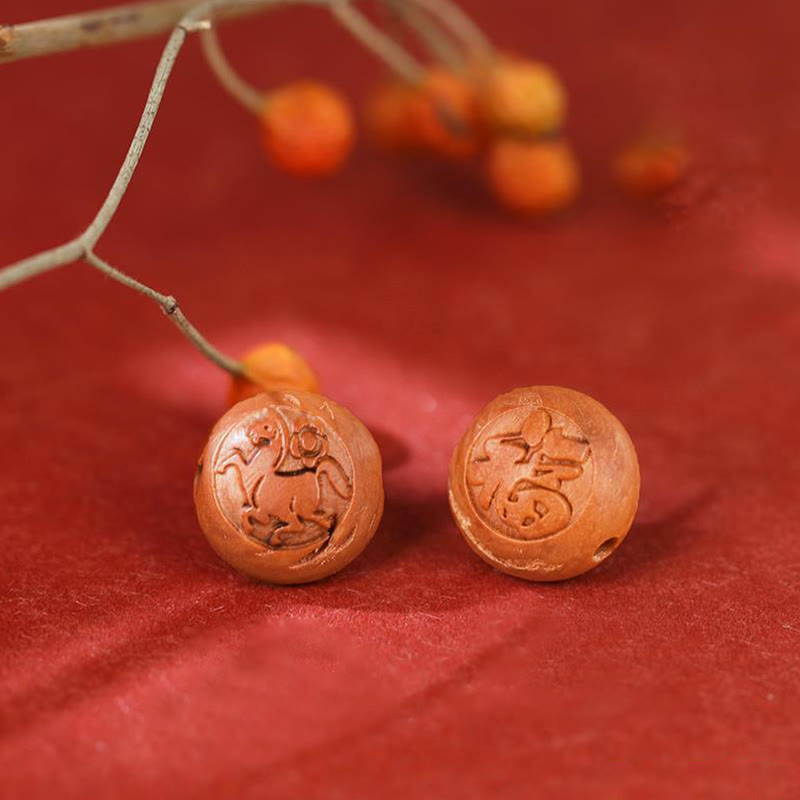 Bracelet de richesse en bois de pêche naturel Buddha Stones et caractère Fu du zodiaque chinois sculpté en cinabre